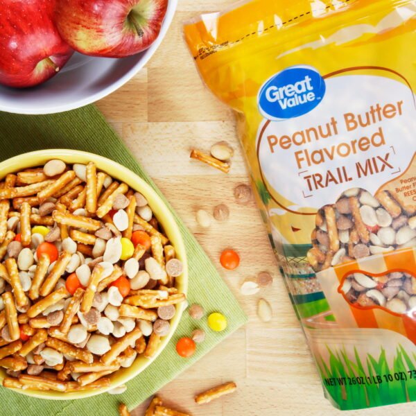 067736e9-d469-4e97-9f04-39cc0b7cc4b5.96aeae64ecfa496d06e83c2af712c330.jpeg Peanut Butter Flavored Trail Mix Made with Reese's Pieces, 26 oz