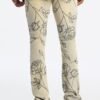 Stacked Skinny Flare Embroidered Falling Roses Jean
