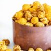 5734eebf-d701-4e61-be21-ba011c1b8ae5.638ab6f658f57e34f0cd7e4ccb99ce2f.jpeg G.H. Cretors Handcrafted Small-Batch Cheese & Caramel Popcorn Mix, 7.5 oz, Gluten-Free Snack