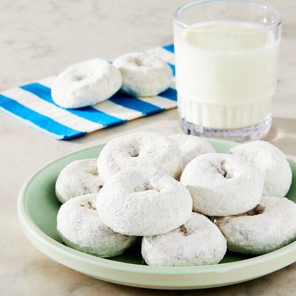 f829e56f-2403-4f22-aadf-cb441c9b4f48.79b21c7ea60454b5d85770a21bf9d971.jpeg Powdered Sugar Mini Donuts, 10 oz